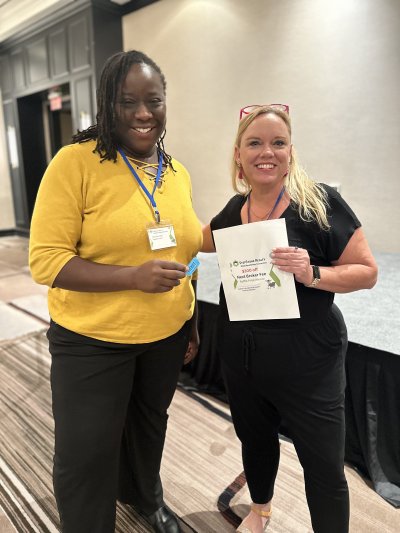 Angie walking agents through a live subject-to deal at the quarterly workshop — whiteboards, contracts, and real numbers